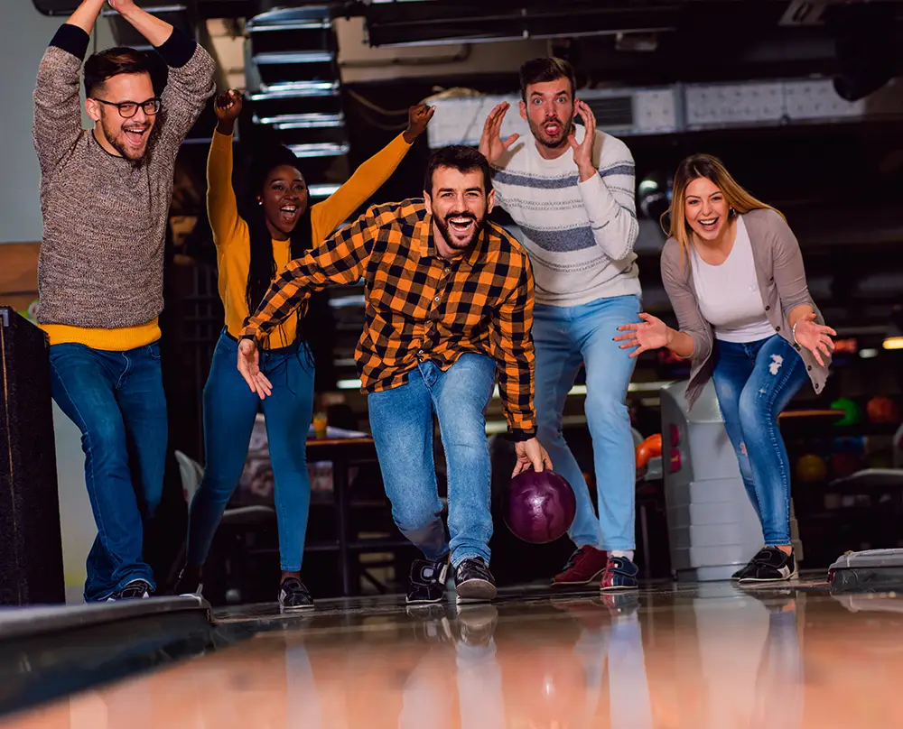people enjoying their ultimate unlimited party package at Bowl 32 in Noblesville IN